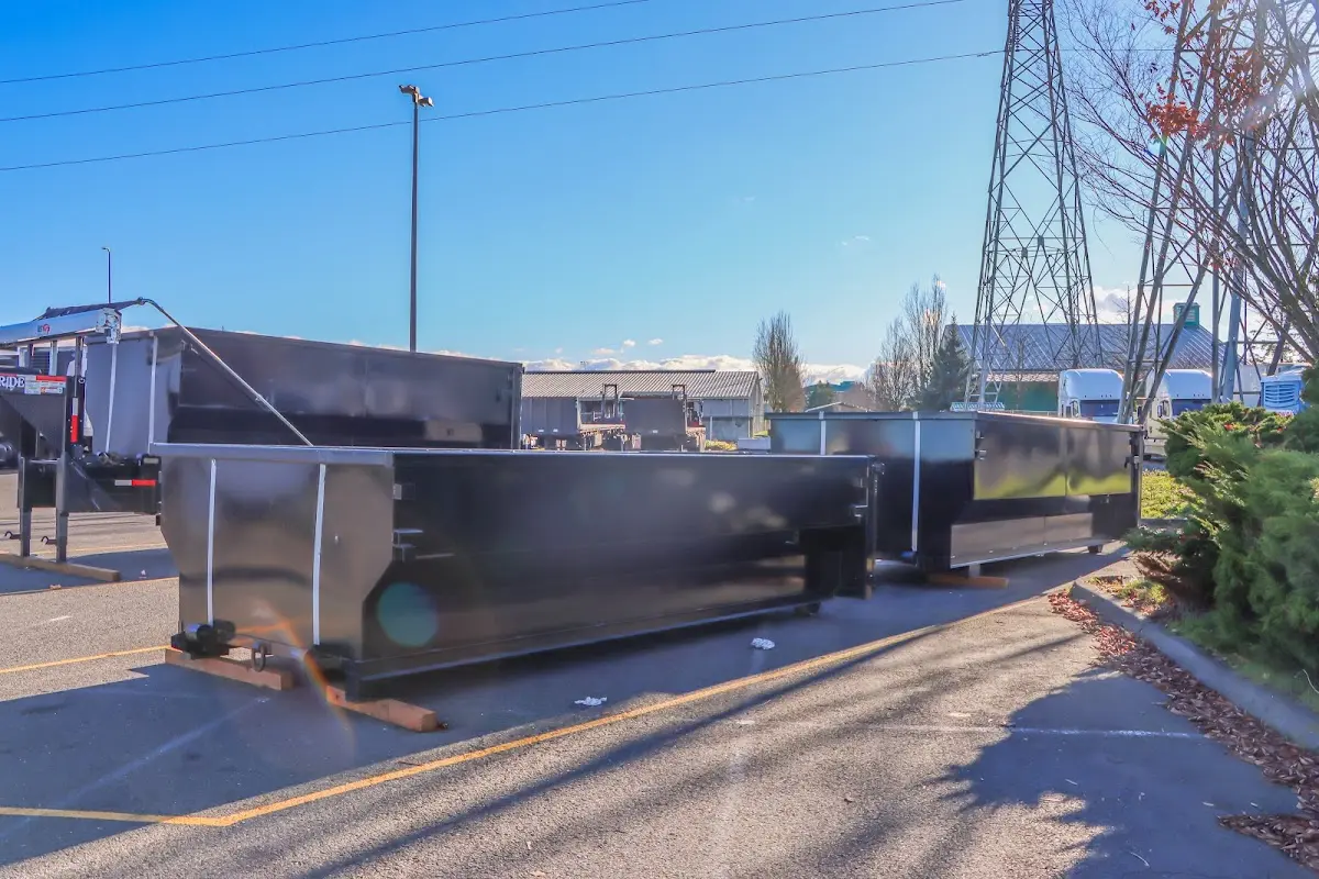 Roll-off dumpster ready for waste disposal at job site for Construction Dumpster Rental in Worcester